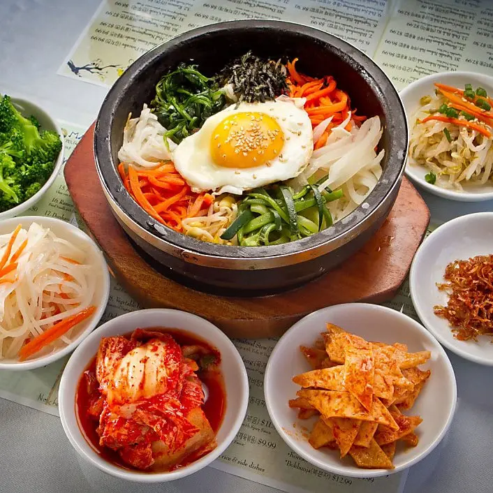 Traditional Korean bibimbap and side dishes